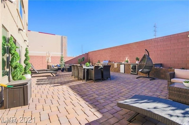 view of patio / terrace with wine cooler