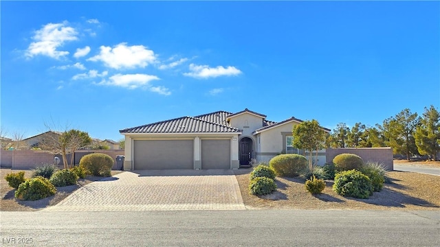 view of front of property featuring a garage