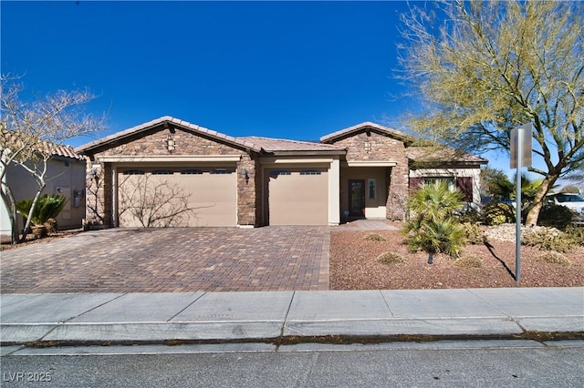 view of front of property with a garage