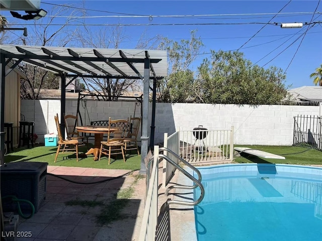 view of pool with a patio and a pergola