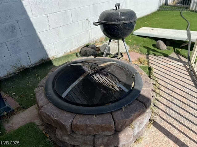 exterior details featuring a fire pit