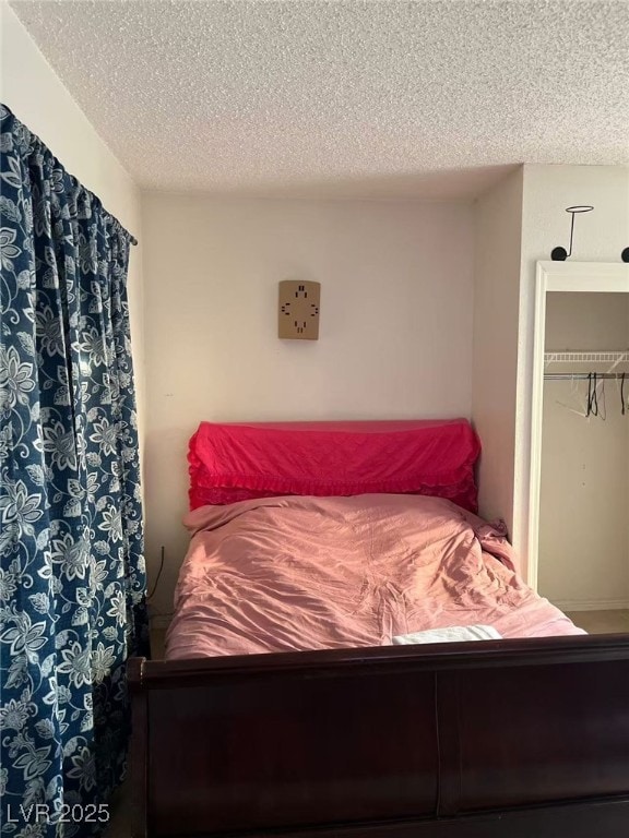 bedroom with a textured ceiling