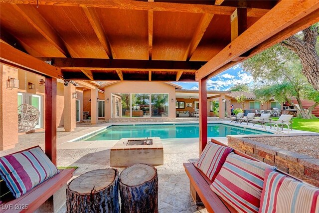 view of pool featuring a patio area