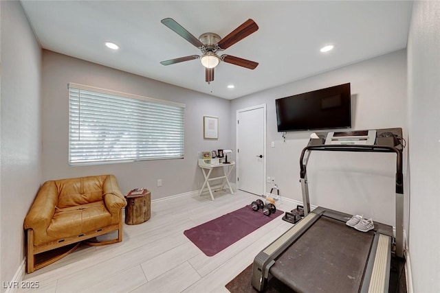 workout area with ceiling fan