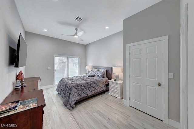 bedroom featuring light wood-type flooring and ceiling fan