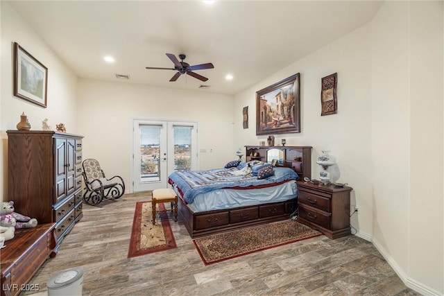 bedroom featuring ceiling fan, french doors, access to outside, and hardwood / wood-style flooring