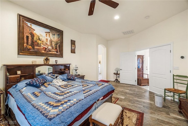 bedroom with ceiling fan and hardwood / wood-style floors