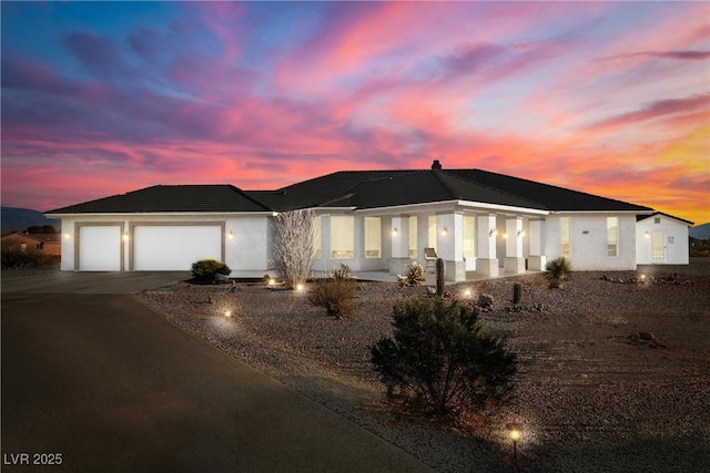 view of front of home with a garage