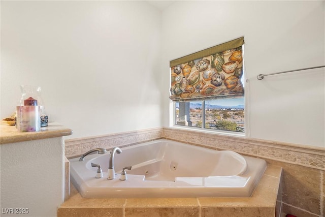 bathroom featuring tiled bath