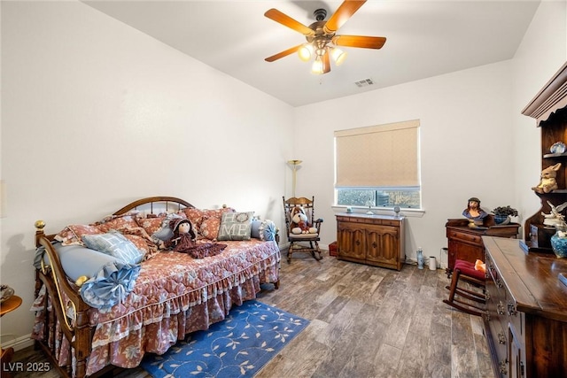 bedroom featuring ceiling fan and wood-type flooring