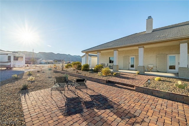 view of patio featuring a mountain view