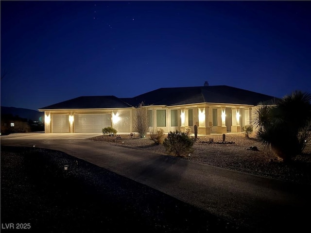 view of front of property featuring a garage