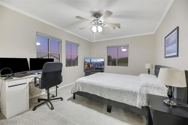 carpeted bedroom featuring ceiling fan and ornamental molding