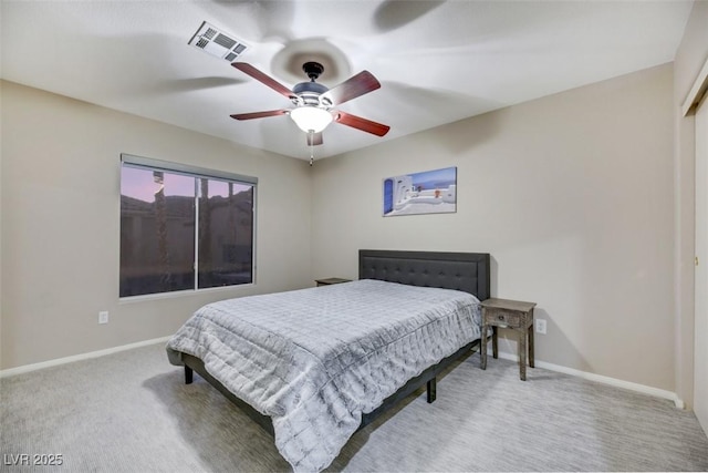 bedroom featuring ceiling fan and carpet floors