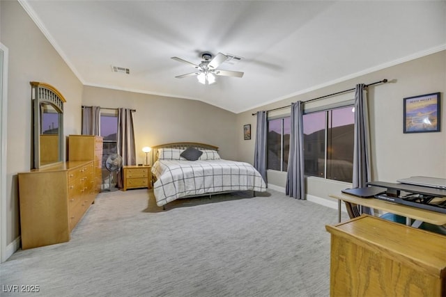 bedroom with ceiling fan, light carpet, and crown molding