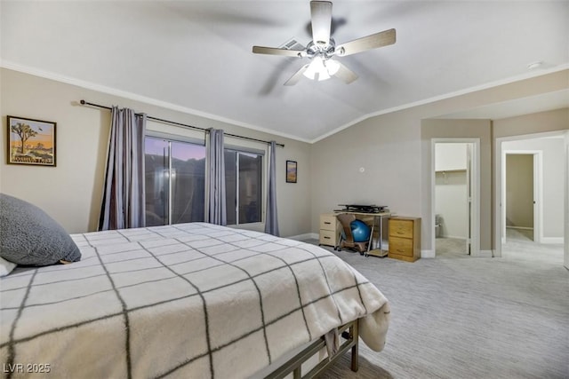 bedroom featuring ceiling fan, light colored carpet, vaulted ceiling, a spacious closet, and a closet