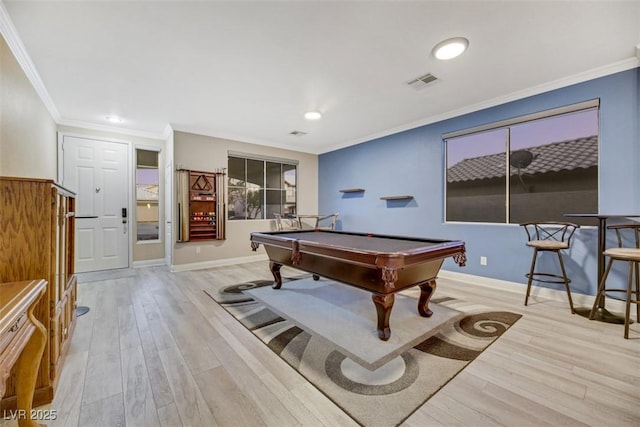 rec room with light wood-type flooring, crown molding, and billiards