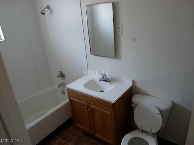 full bathroom featuring shower / bathtub combination, toilet, and vanity