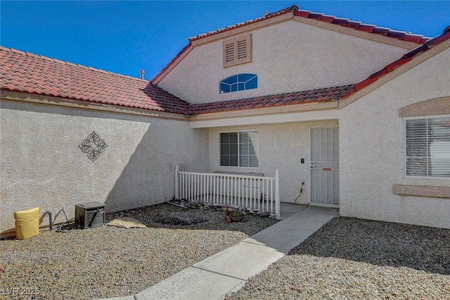 entrance to property with cooling unit