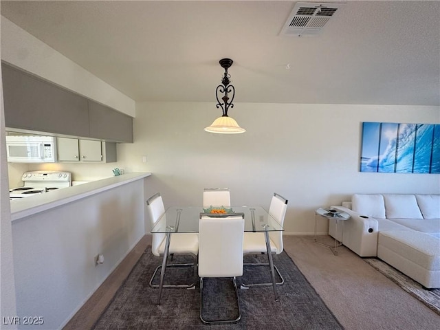 view of carpeted dining room