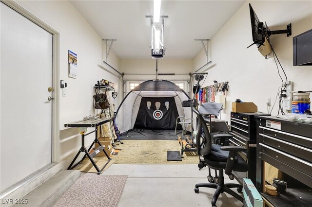 garage featuring a garage door opener