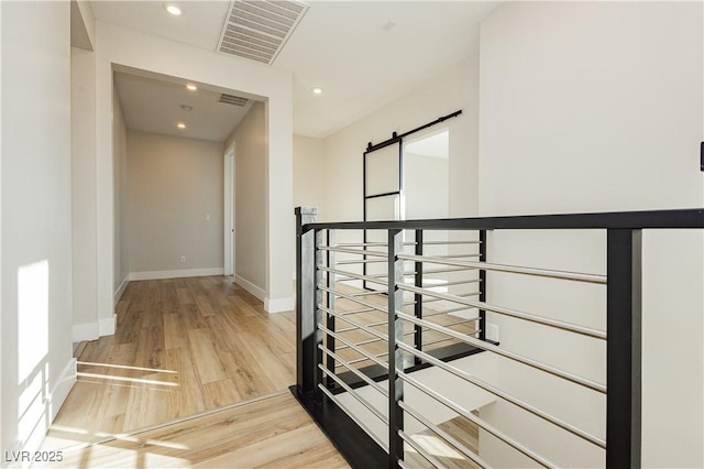 hallway featuring light hardwood / wood-style floors