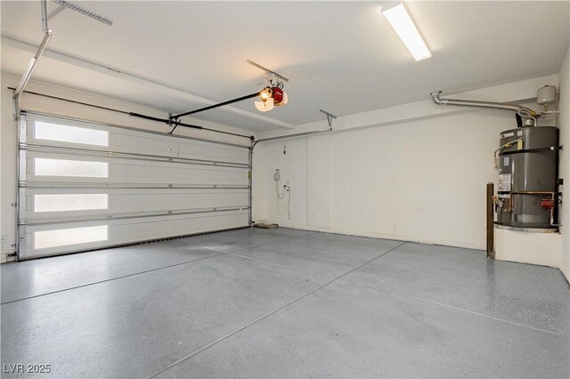 garage with a garage door opener and water heater