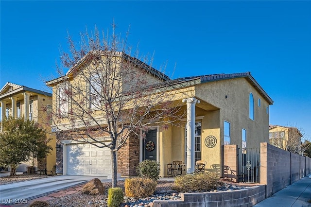 view of front of property with a garage