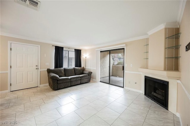 living room featuring crown molding