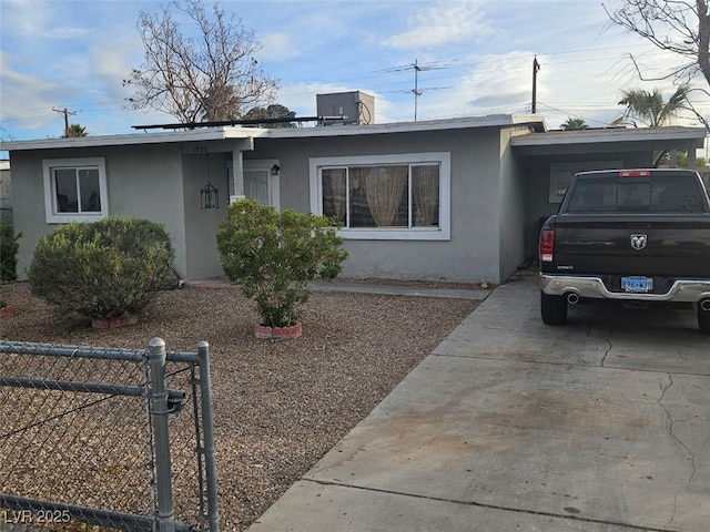 ranch-style house with central AC unit