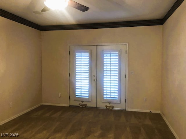 carpeted empty room featuring ceiling fan, french doors, and crown molding