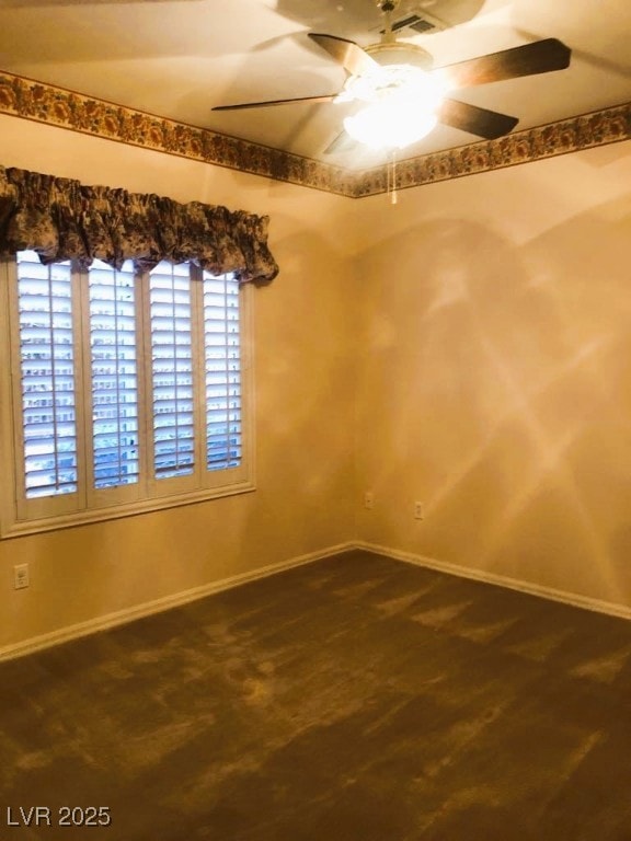 spare room featuring ceiling fan