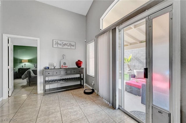 entryway featuring light tile patterned flooring