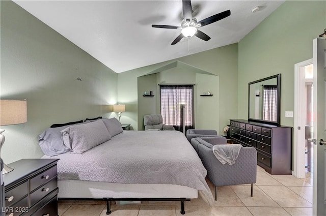 tiled bedroom featuring ceiling fan and vaulted ceiling