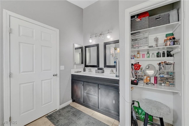 bathroom featuring vanity and tile patterned flooring