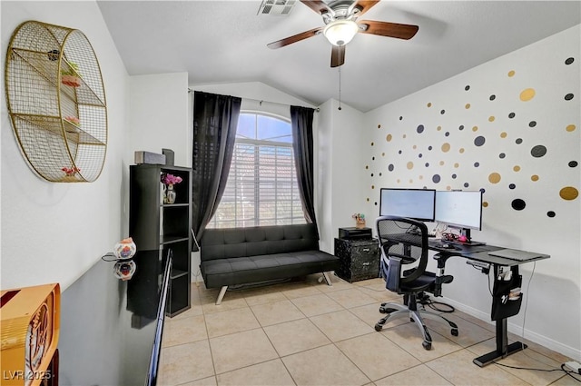 tiled office with ceiling fan and vaulted ceiling