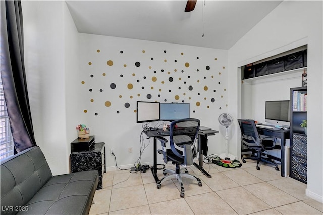 tiled office space featuring ceiling fan and vaulted ceiling