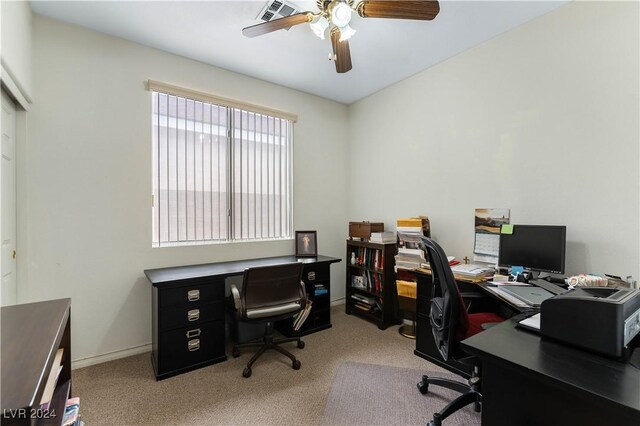 office area with light carpet and ceiling fan