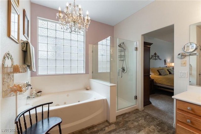 bathroom featuring a chandelier, shower with separate bathtub, and vanity