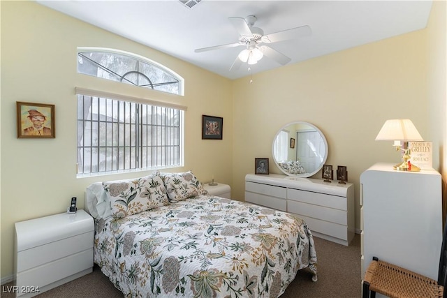 bedroom with ceiling fan and carpet