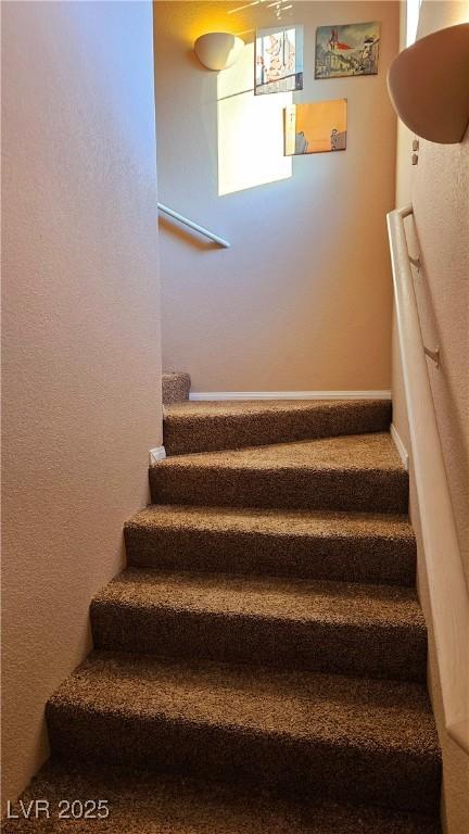 stairs with a wealth of natural light