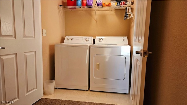 laundry room featuring washer and dryer