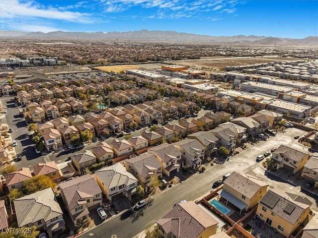 drone / aerial view featuring a mountain view