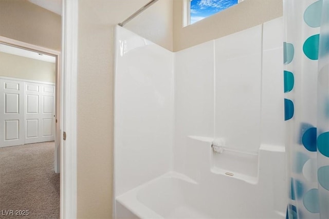 bathroom featuring shower / bath combination with curtain