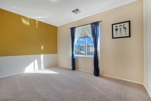 view of carpeted spare room