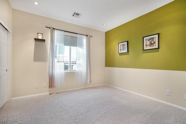 spare room with carpet flooring