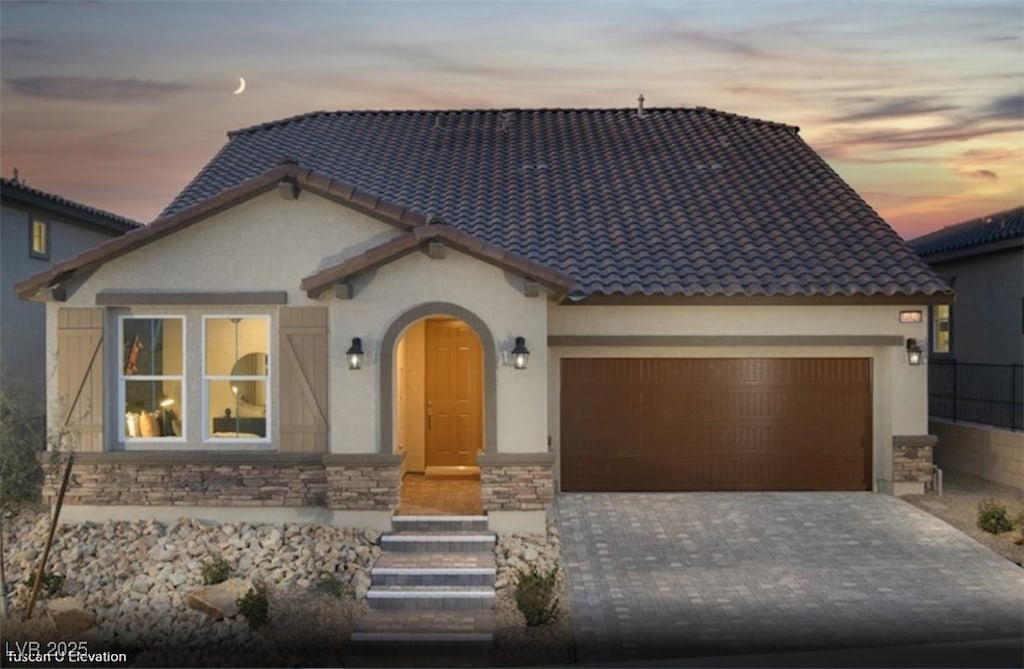 view of front of house with a garage