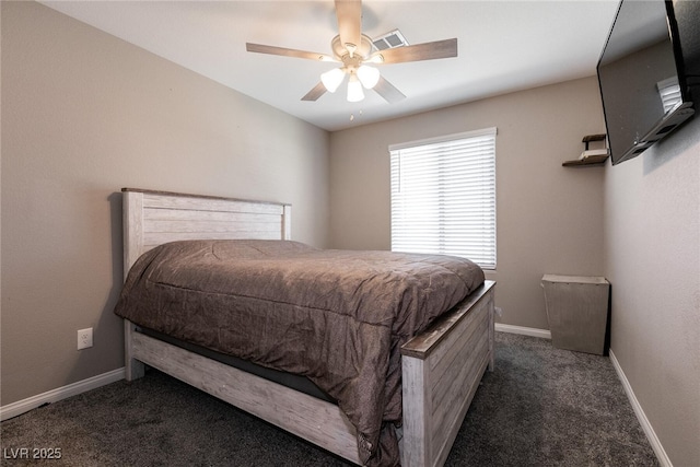 bedroom featuring ceiling fan and dark colored carpet