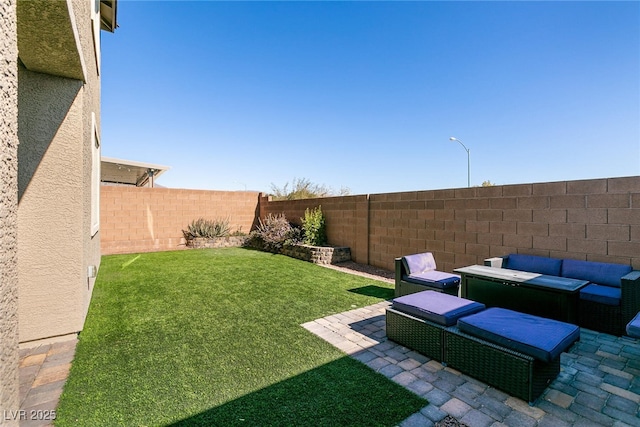 view of yard with a patio area and outdoor lounge area