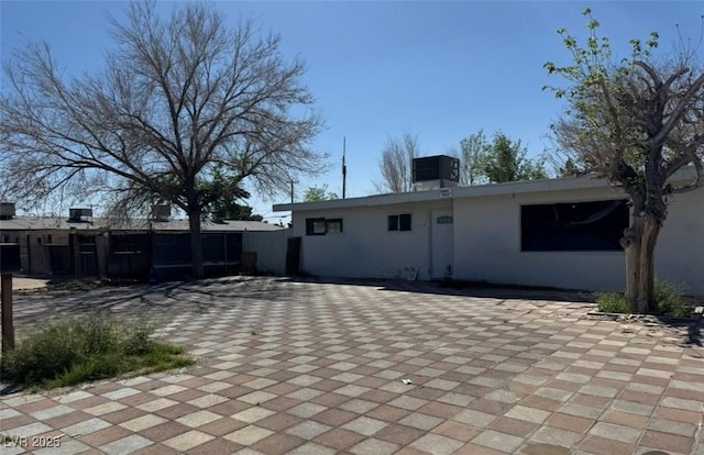 2127 Crawford St, North Las Vegas, NV 89030 - rear view of house with stucco siding
